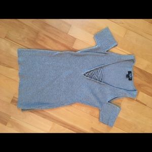 Grey form fitting lace up shirt